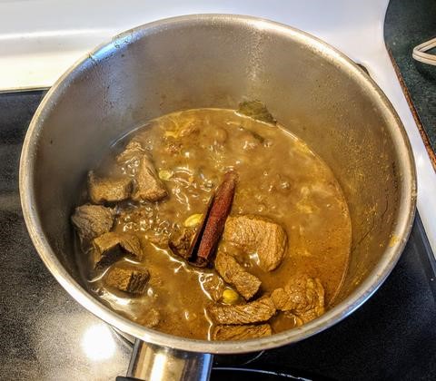 Bangladesh beef curry simmering