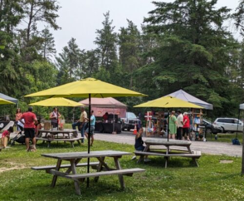 picnic tables at the log farm barrhaven farmers market