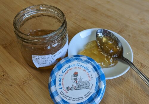 Pear and ginger jelly jar and jelly in a spoon, by Linda's Garden Goodies from the Cornwall Kinsmen Farmers Market